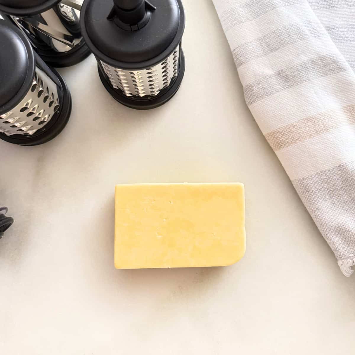 block of cheddar cheese