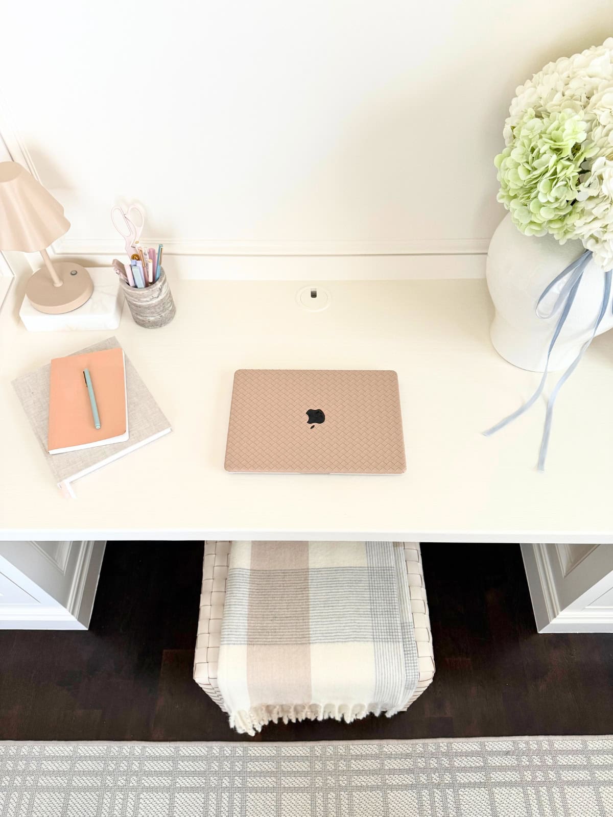 white built-in desk with cable desk grommet
