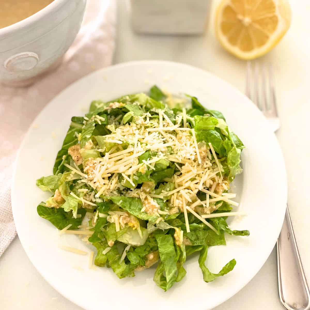 Caesar salad with homemade dressing and shredded parmesan