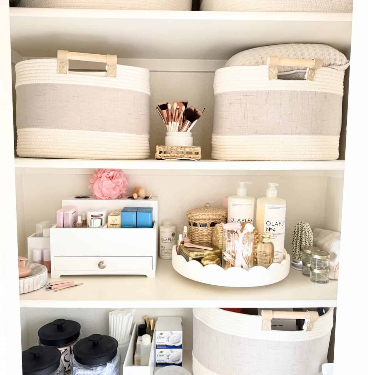 lazy susan organizing bath products in a bathroom closet