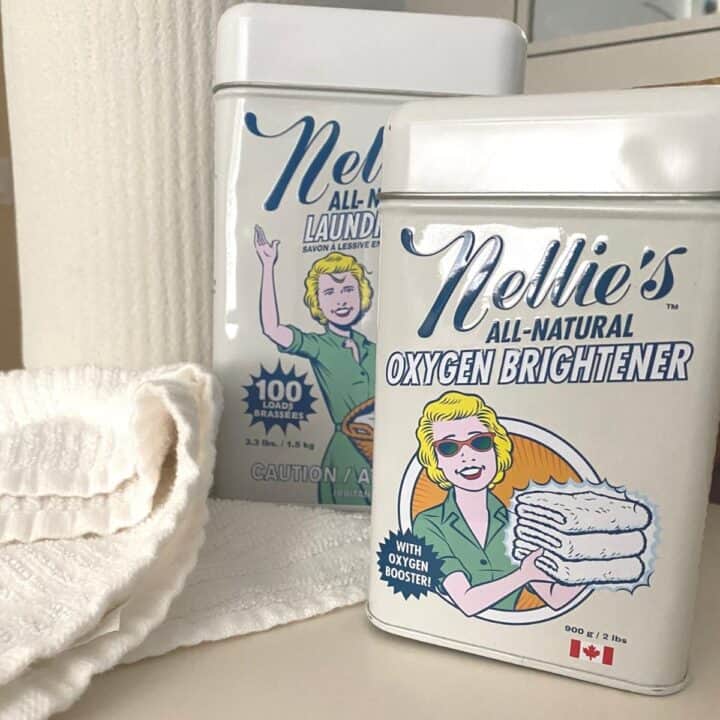 Nellie's all-natural oxygen brightener, a whitener for clothing. Image is of two of the tins.