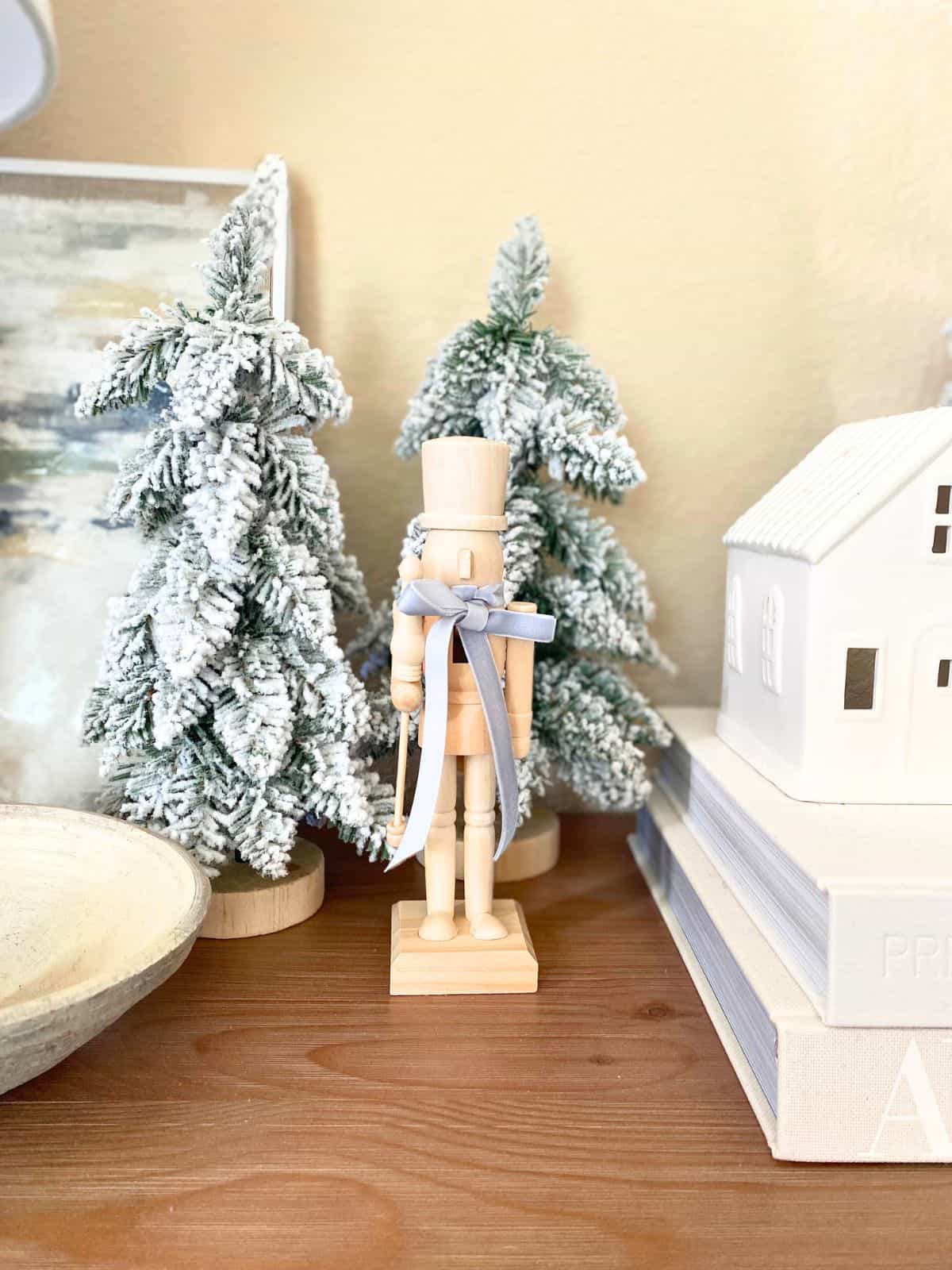 nutcracker with blue velvet bow