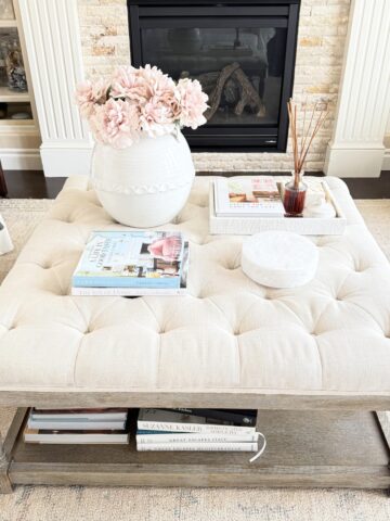 tufted ottoman decorated