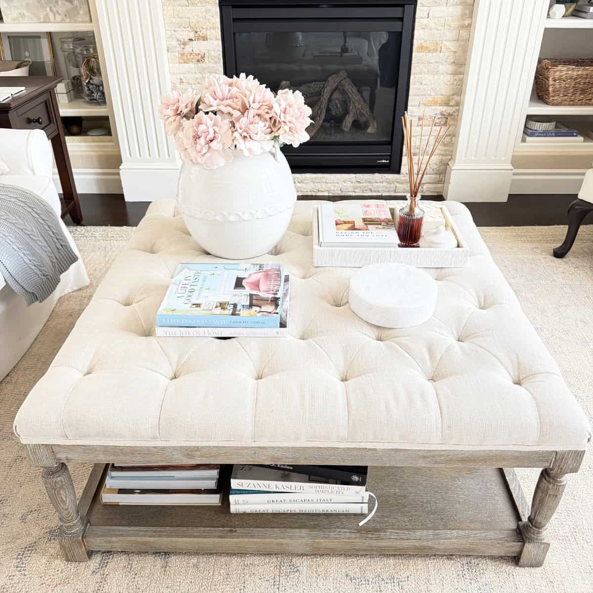 tufted ottoman decorated