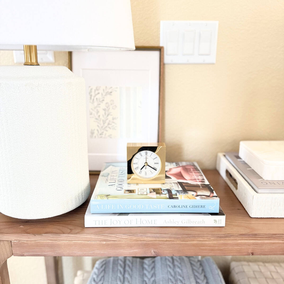 books and decor styled on a console table