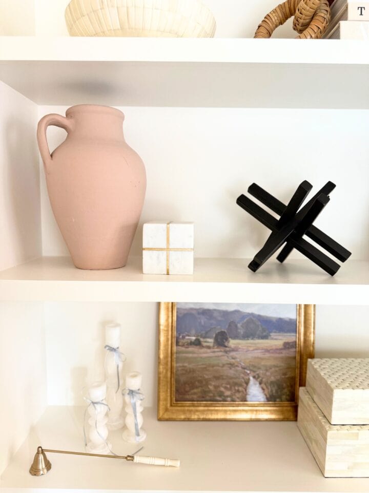 art and other objects decorating shelves