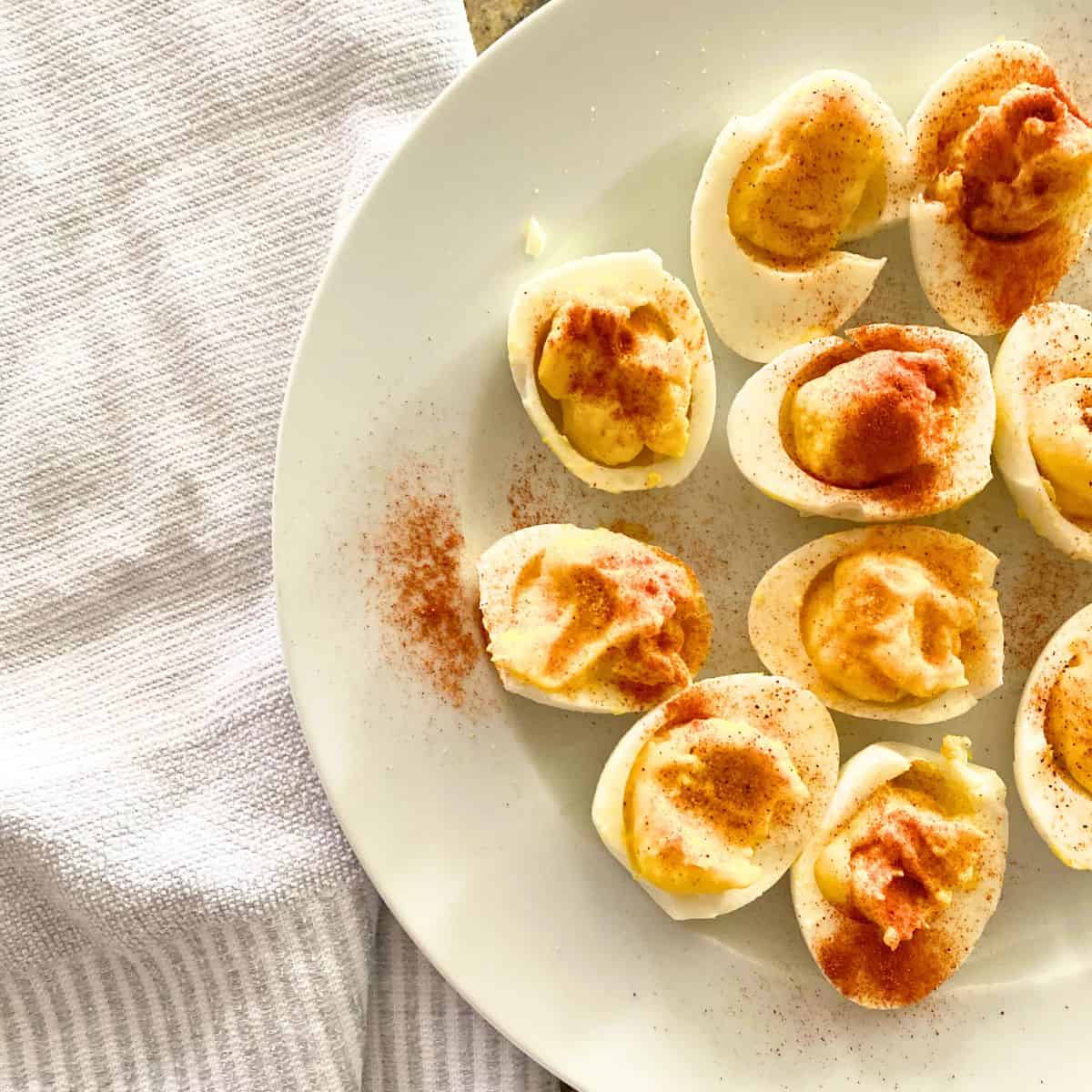 Artistic deviled eggs on a white plate