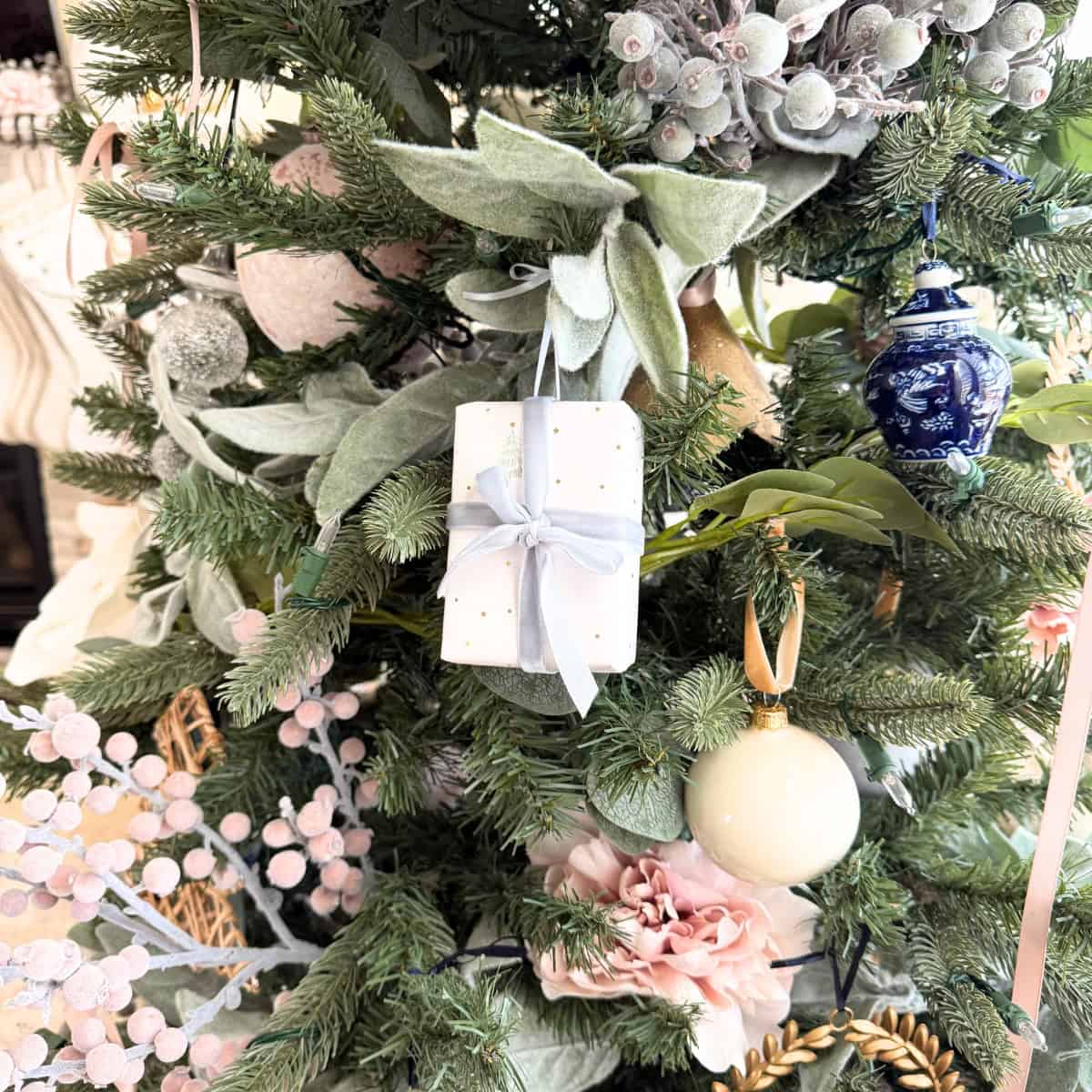 mini diy present ornament hanging on christmas tree