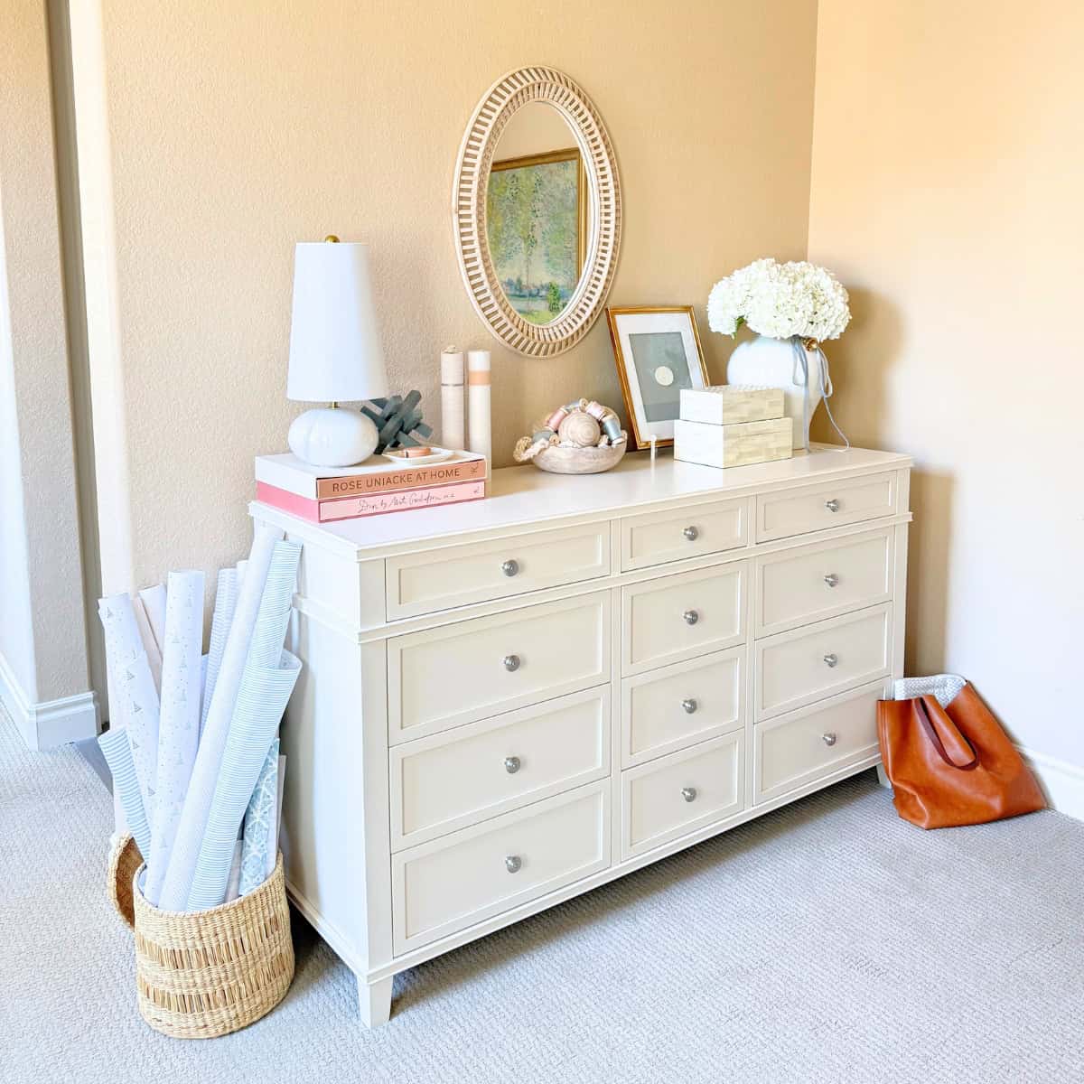 white dresser with decor on top