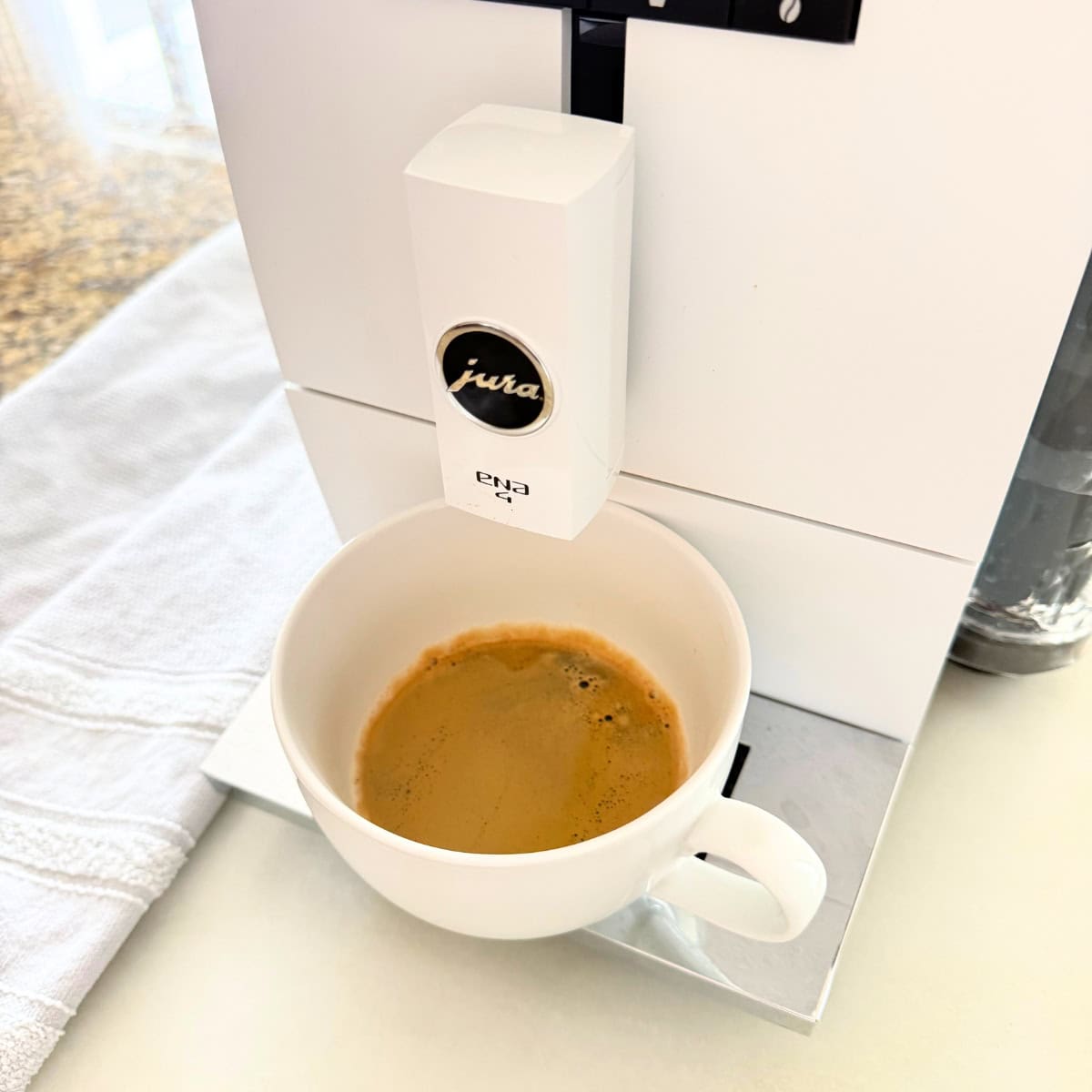 espresso in a mug from a jura