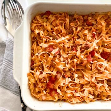 Fettuccine with tomato sauce in roasting pan