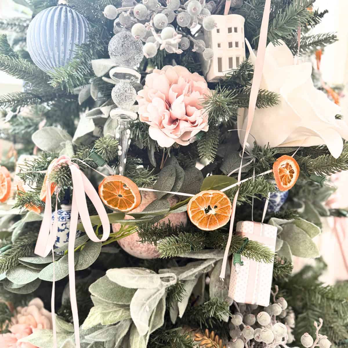 orange garland on christmas tree