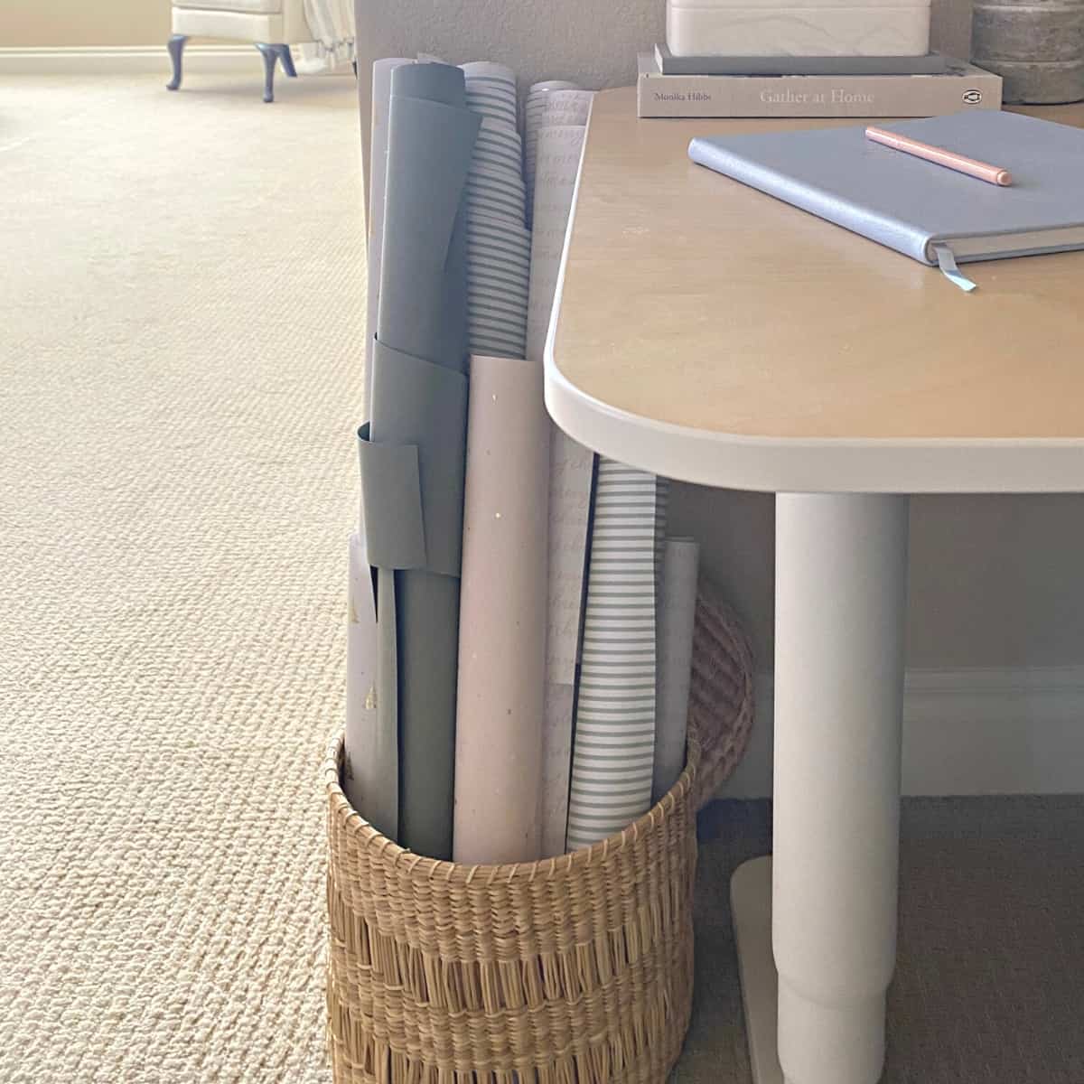 Rolls of gift wrap organized in a basket