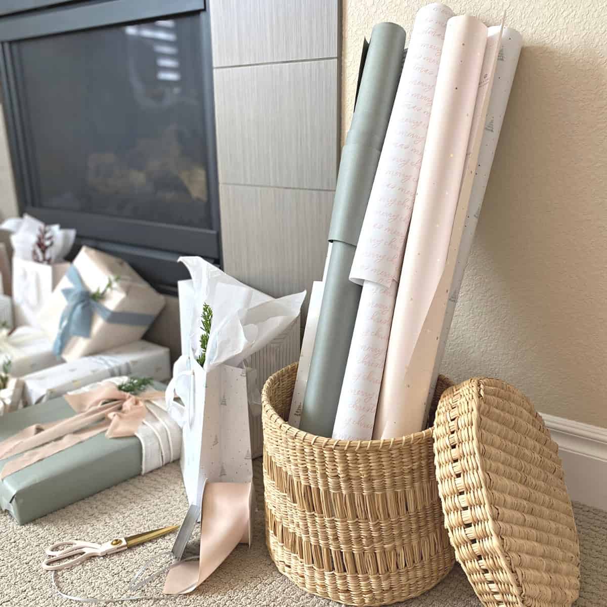 Rolls of gift wrap organized in a basket