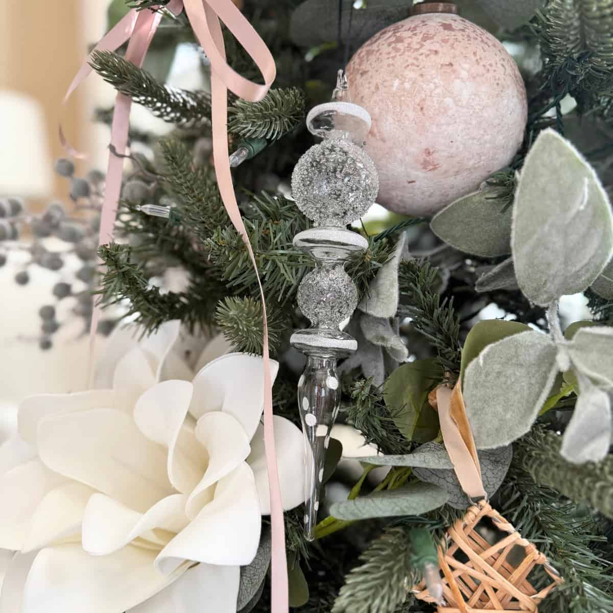 glass finial ornament on christmas tree