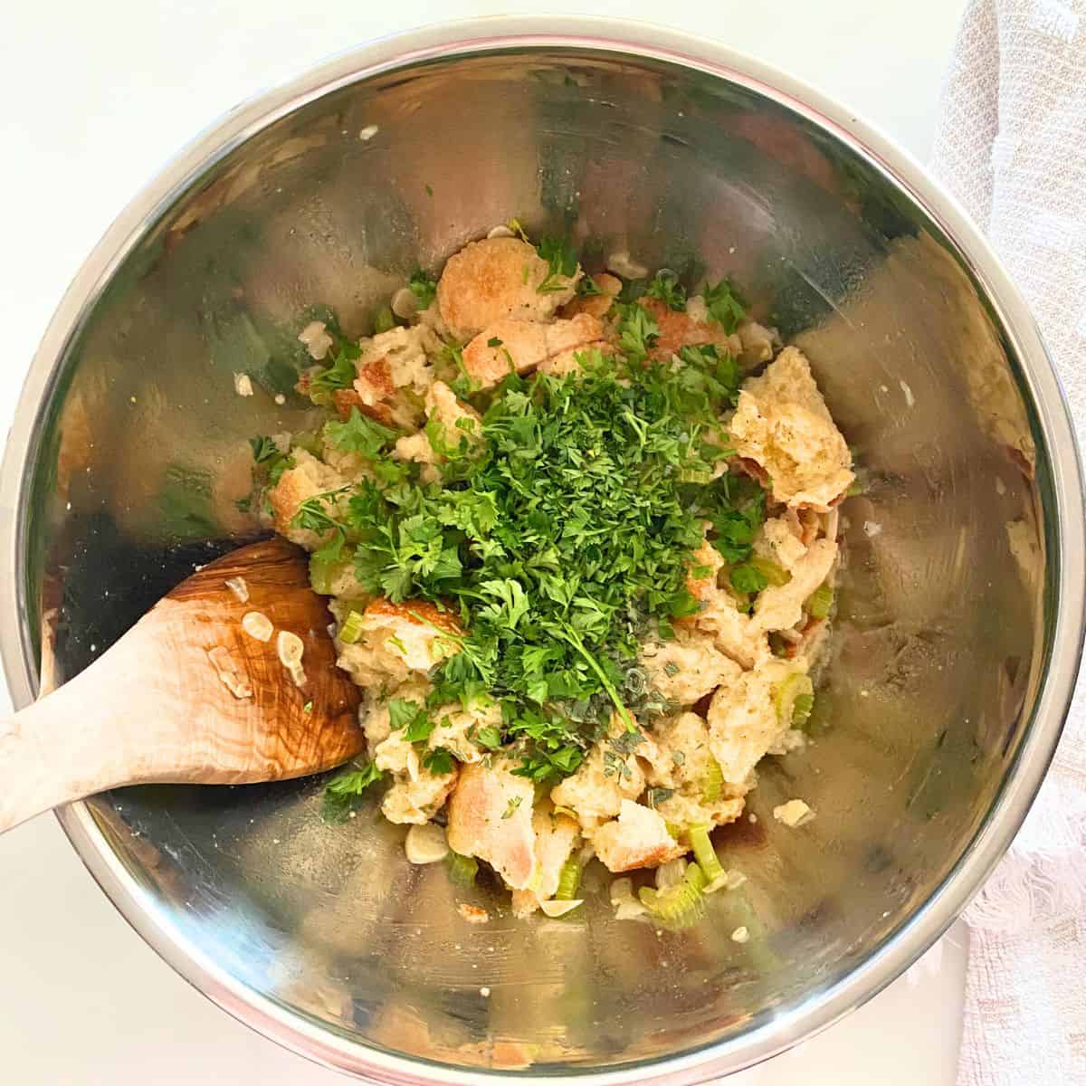 stainless steel mixing bowl with ingredients for stuffing