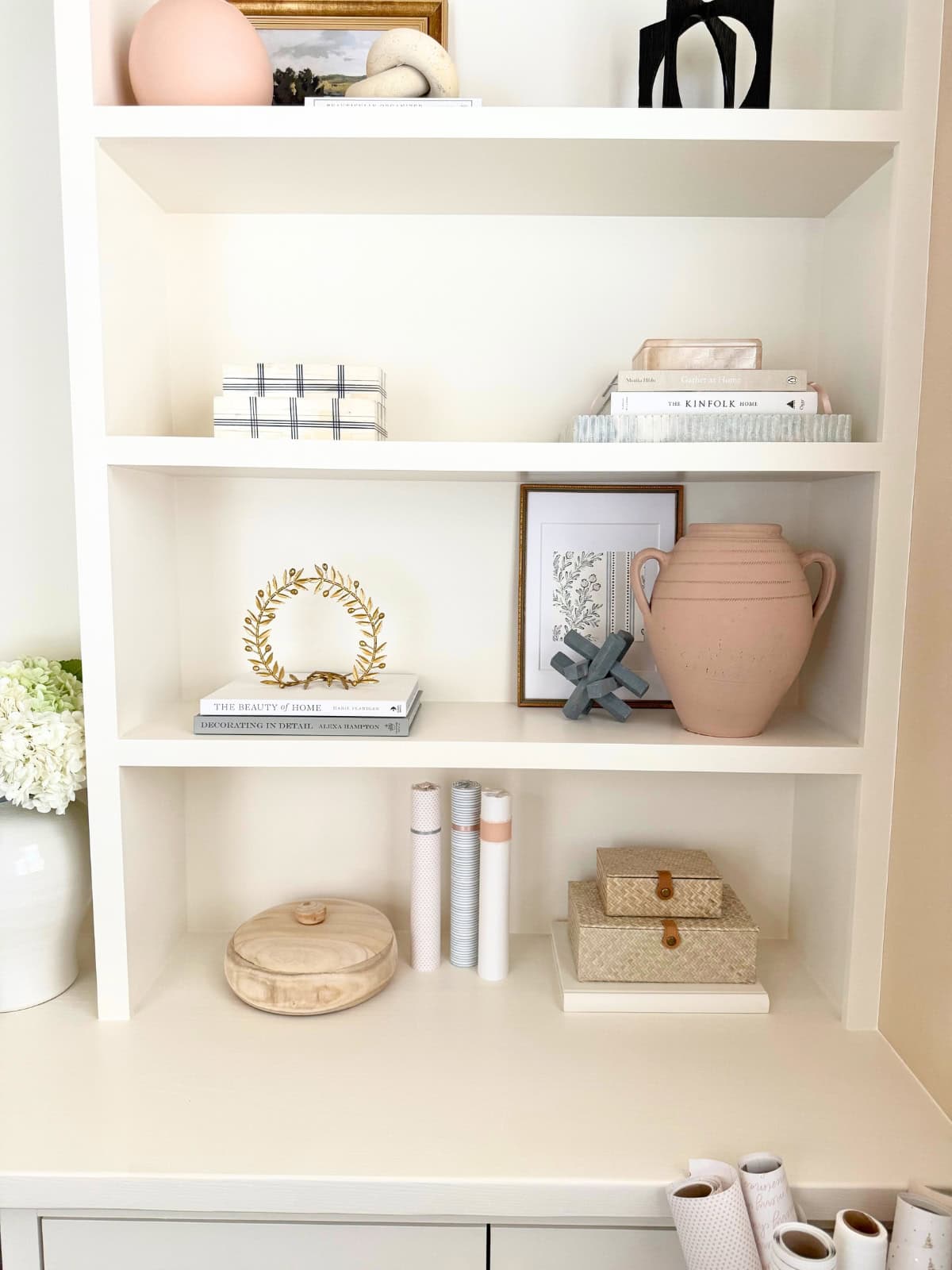 home office shelves styled with decor