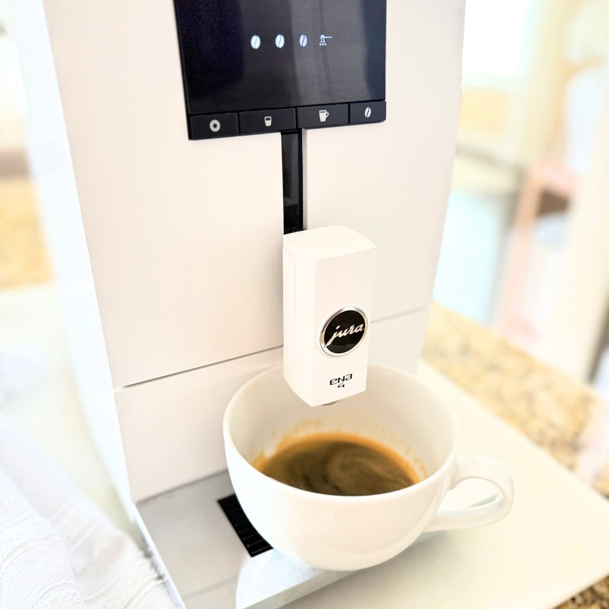 espresso in a mug from a jura