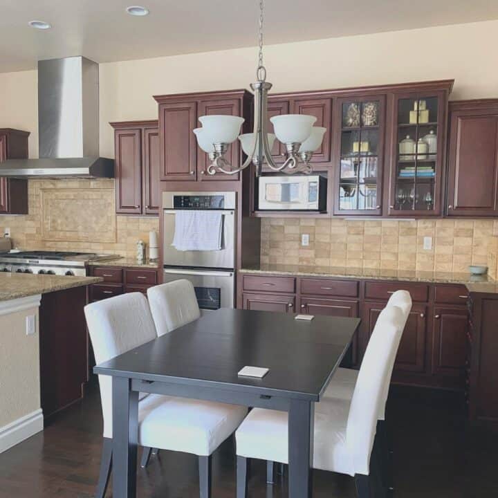 Image showing kitchen with cabinets that do not go all the way to the ceiling.