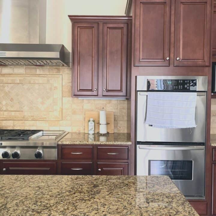 Image showing kitchen with cabinets that do not go all the way to the ceiling