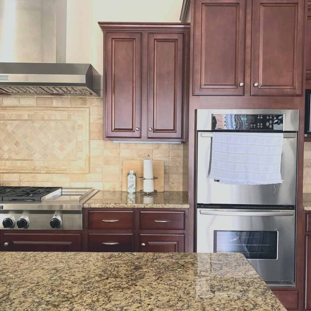 Image showing kitchen with cabinets that do not go all the way to the ceiling