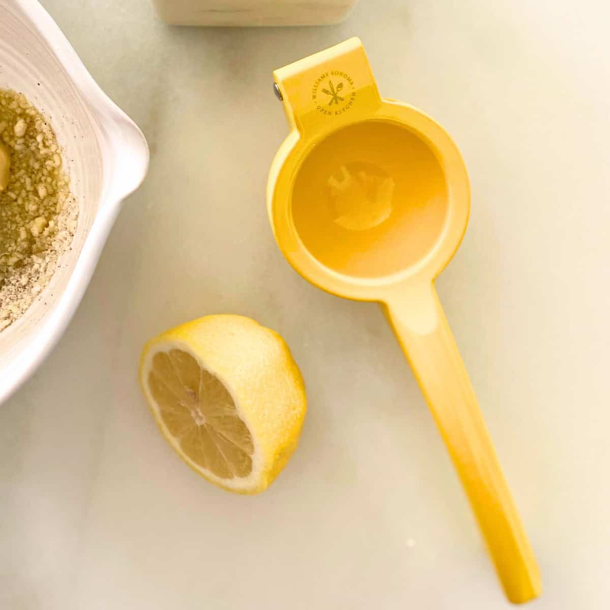 lemon press on marble counter