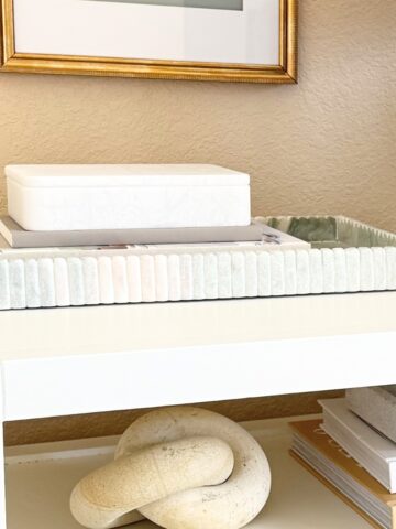 decorated marble tray on nightstand