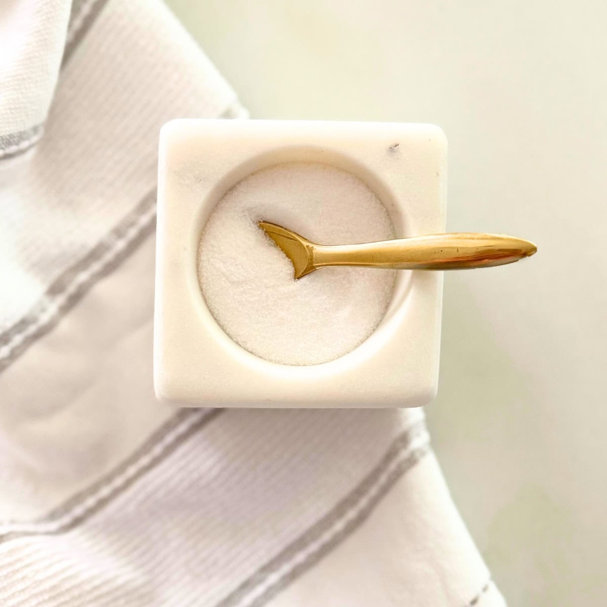 marble salt cellar with gold brass spoon