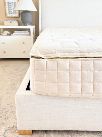 organic mattress on upholstered bed frame