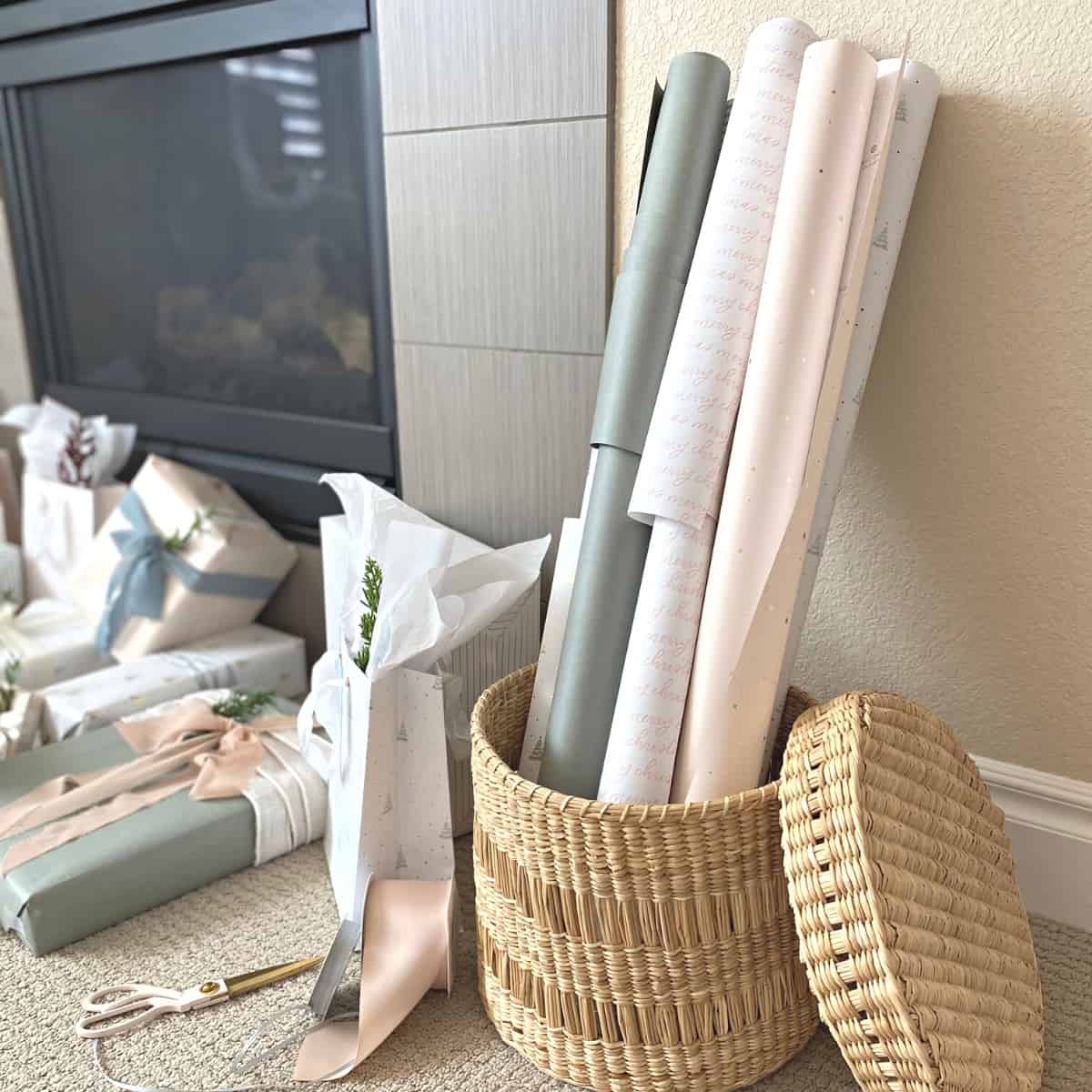 Rolls of neutral wrapping paper stacked in a round basket