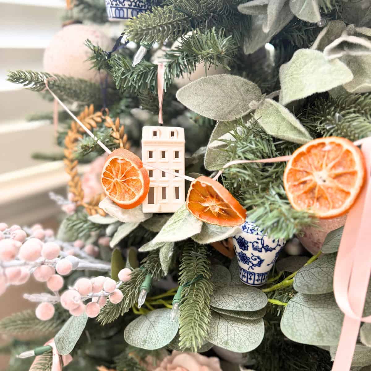orange garland on christmas tree