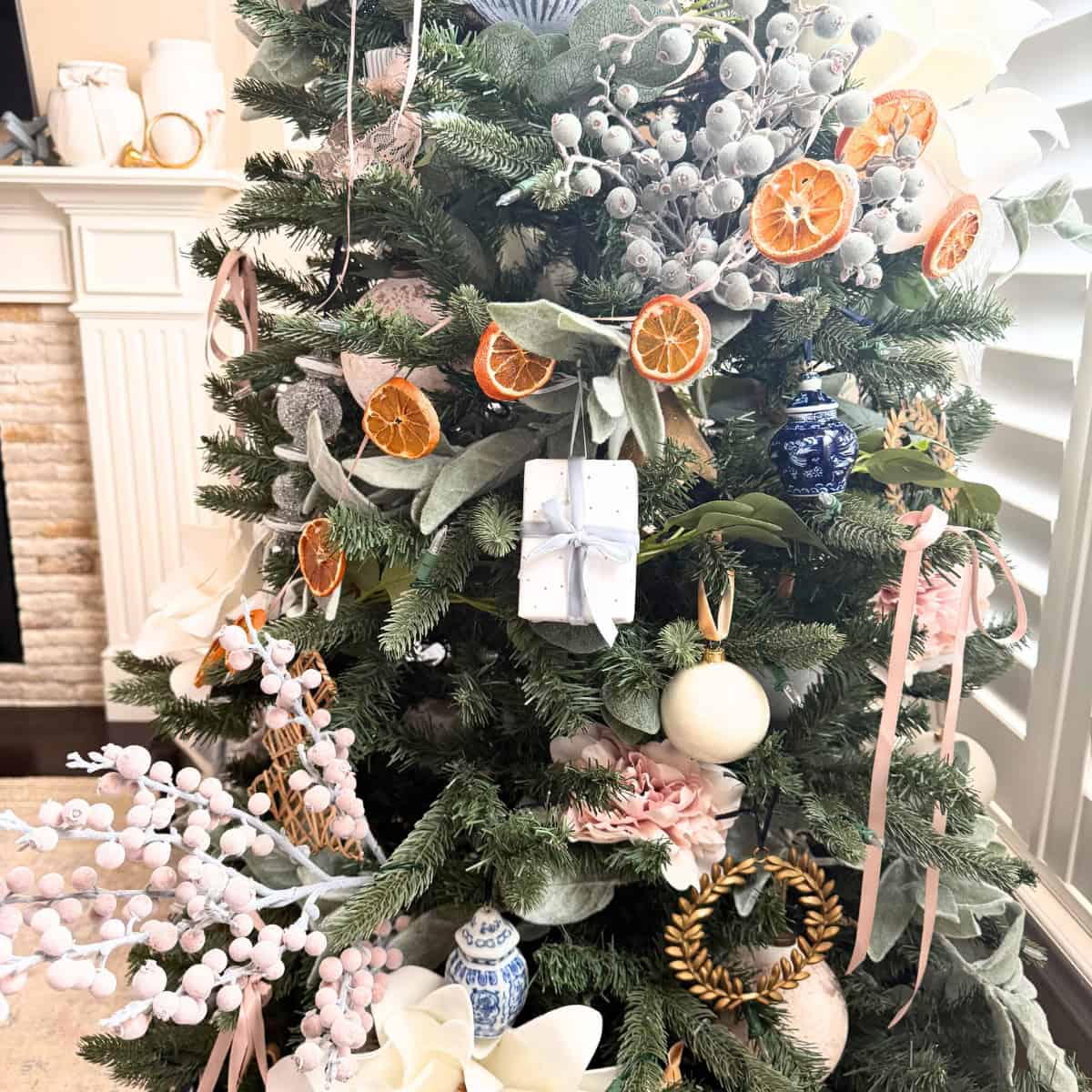 orange garland on christmas tree