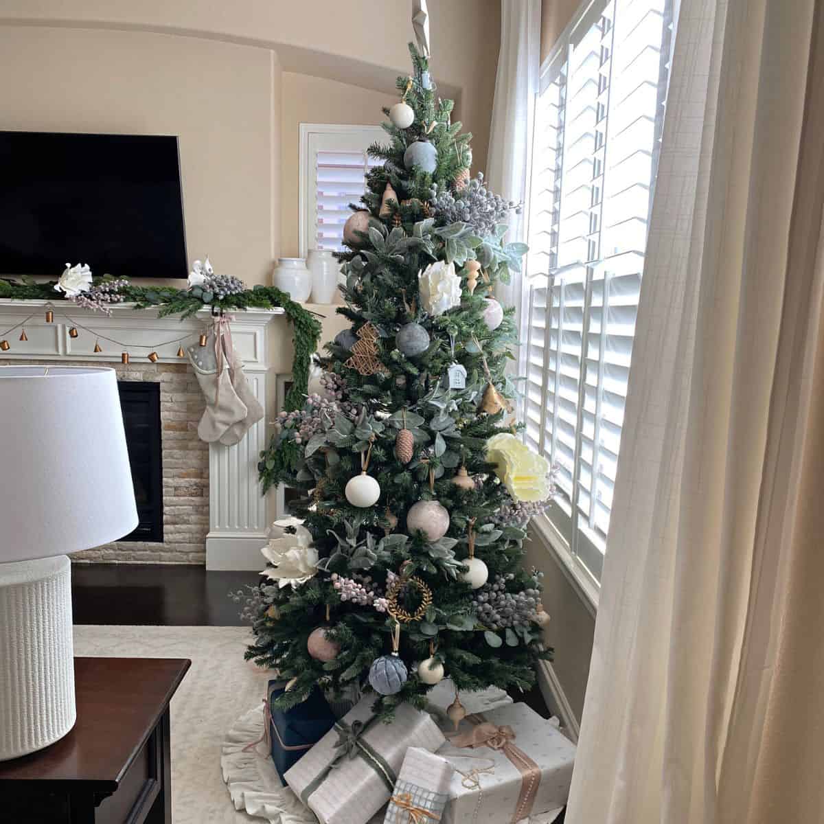 Christmas tree decorated in pastel ornaments