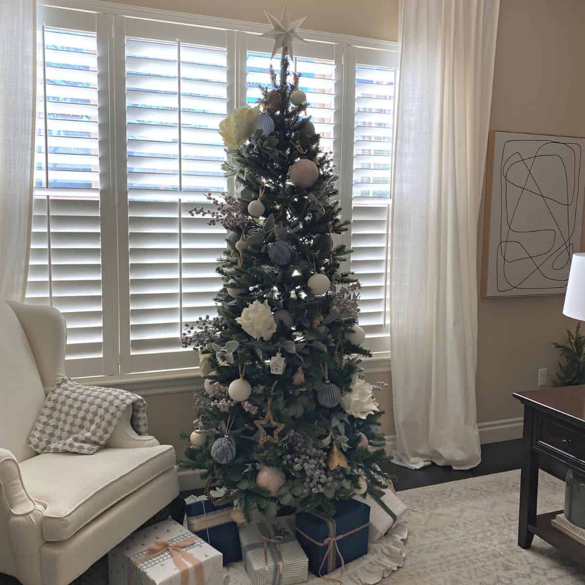 Christmas tree decorated in pastel ornaments
