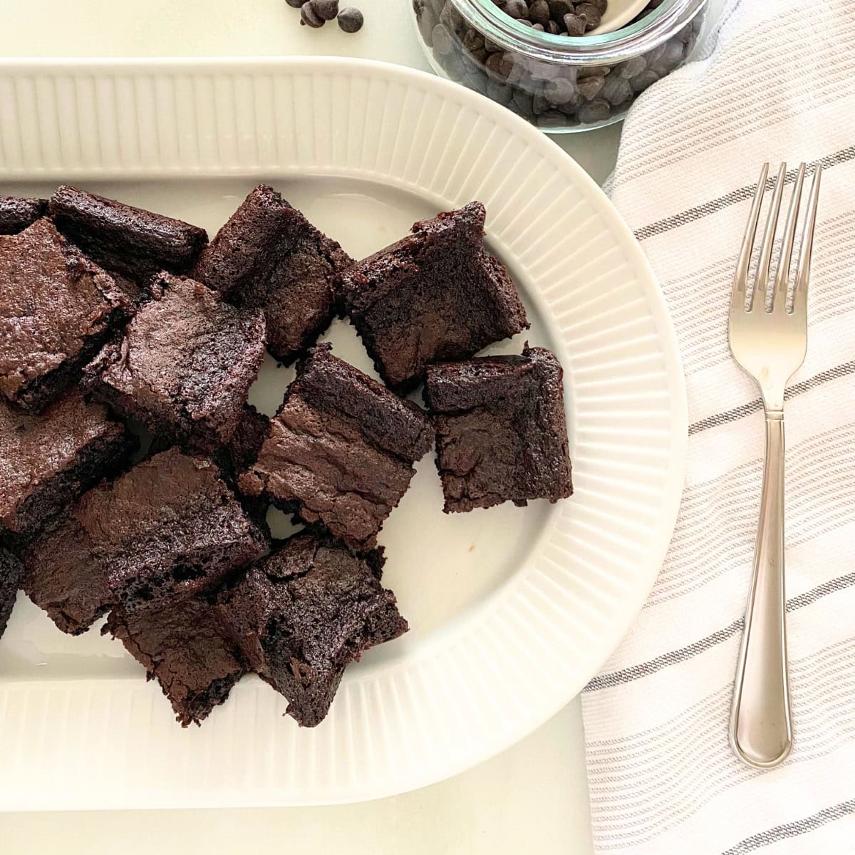 brownies on white porcelain platter