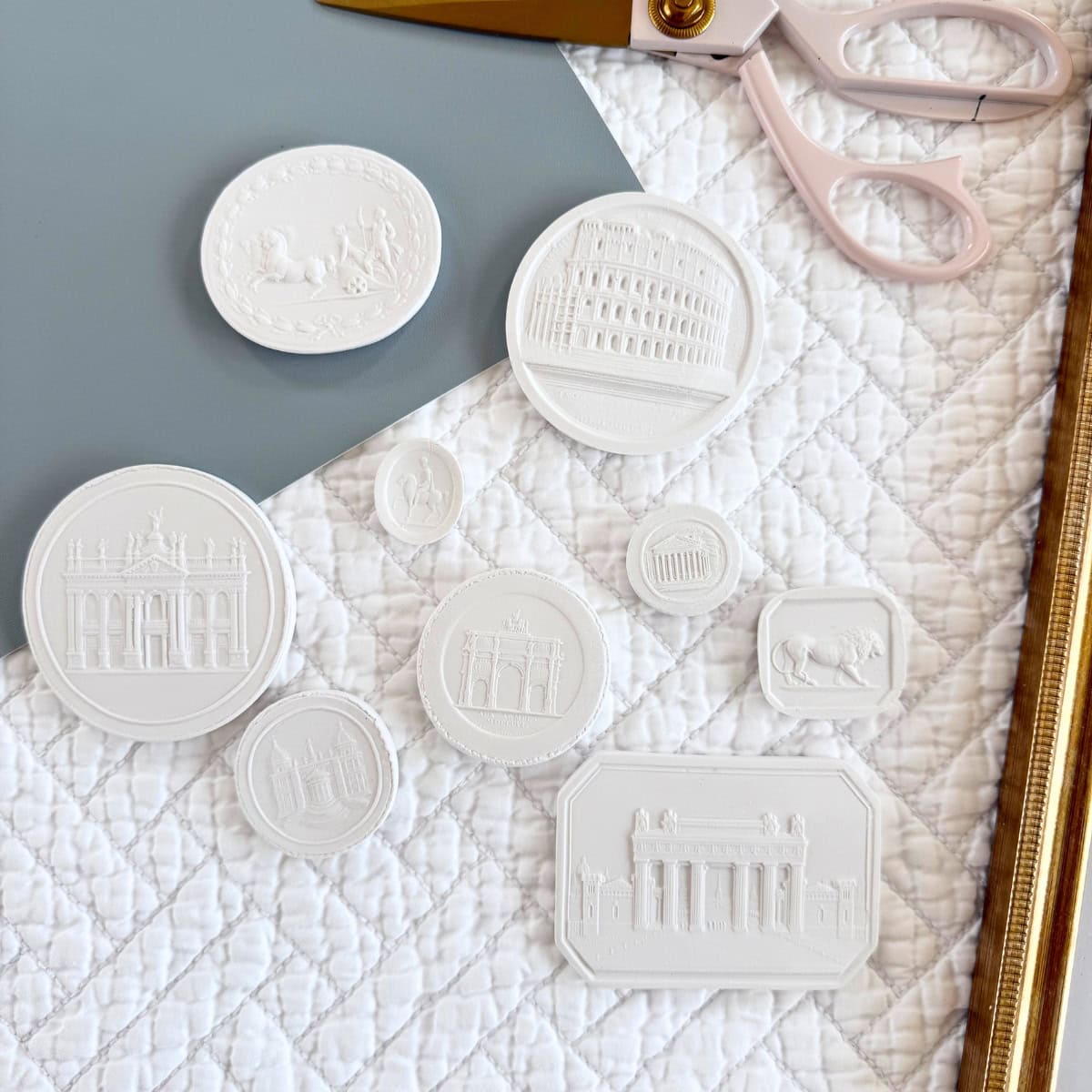 white plaster intaglios with supplies