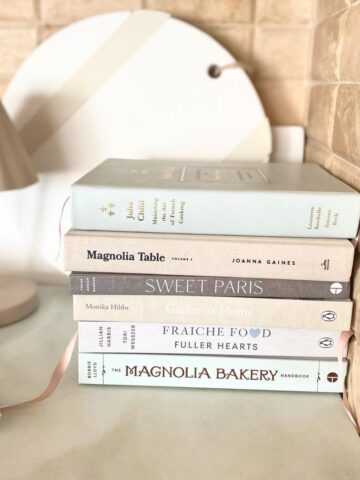 cookbooks stacked in kitchen