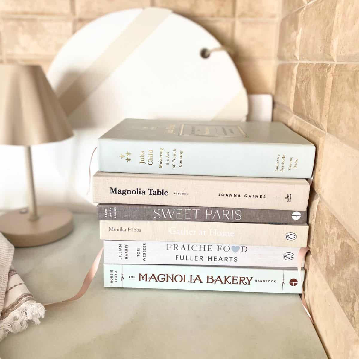 cookbooks stacked in kitchen