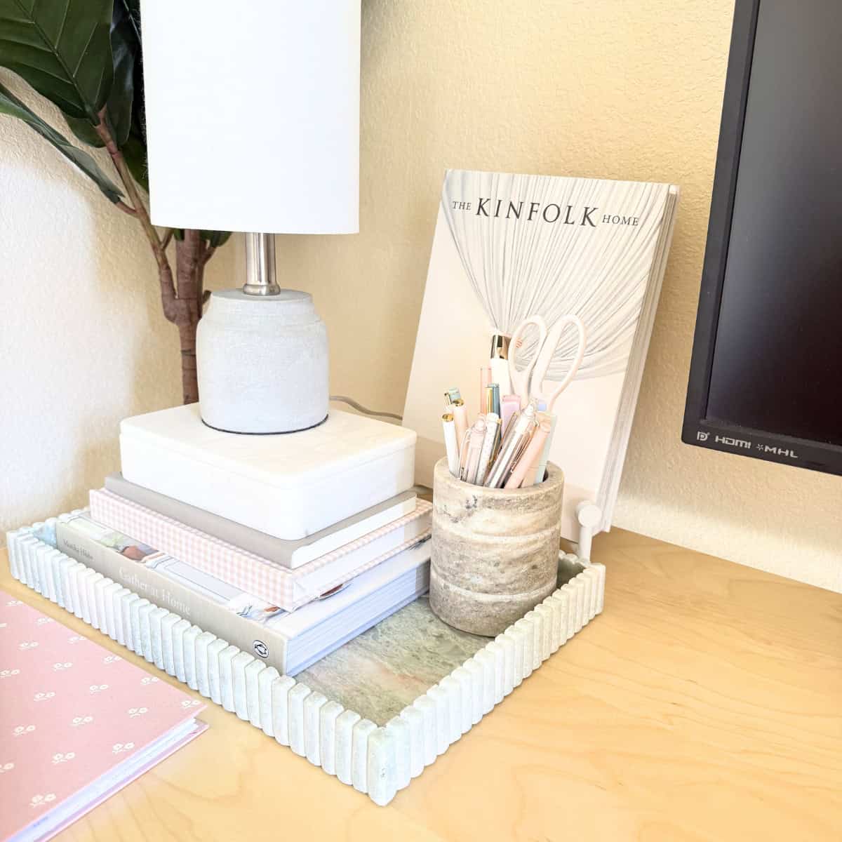 desk accessories in tray on desk