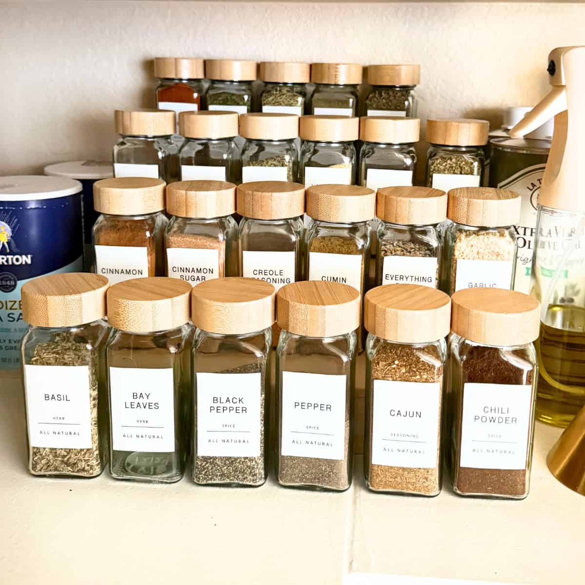 spice jar set with labels on tiered tray