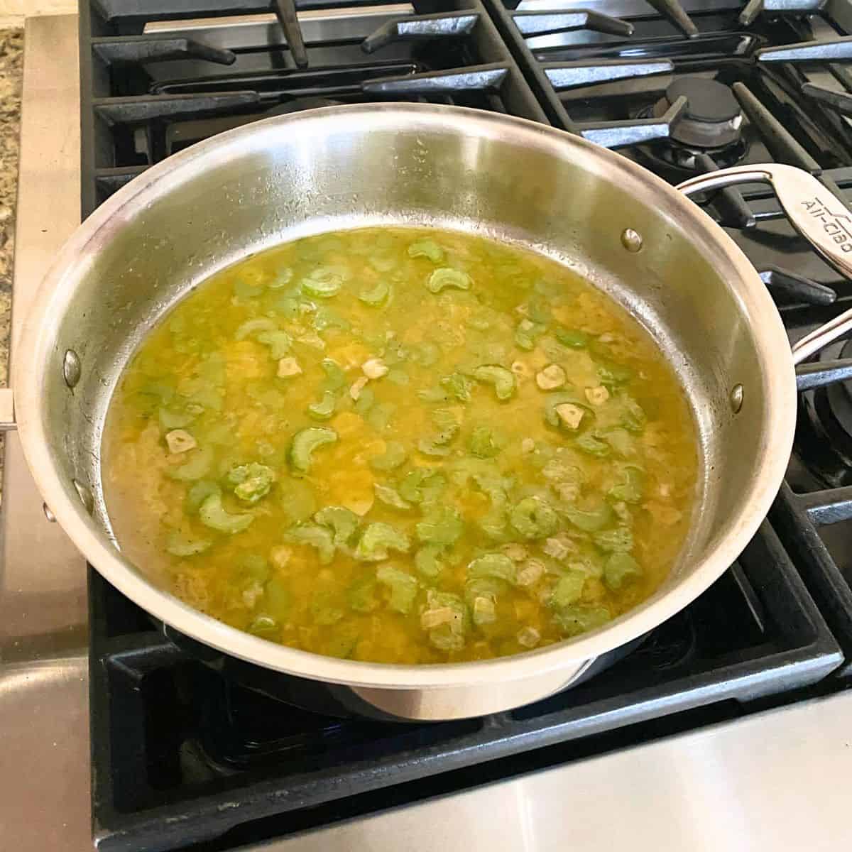 onions, celery, and garlic in saute pan