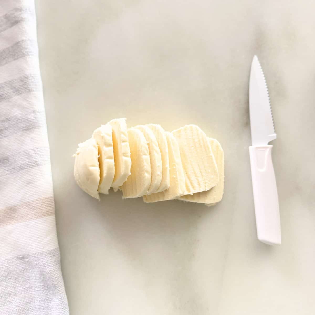 sliced mozzarella log