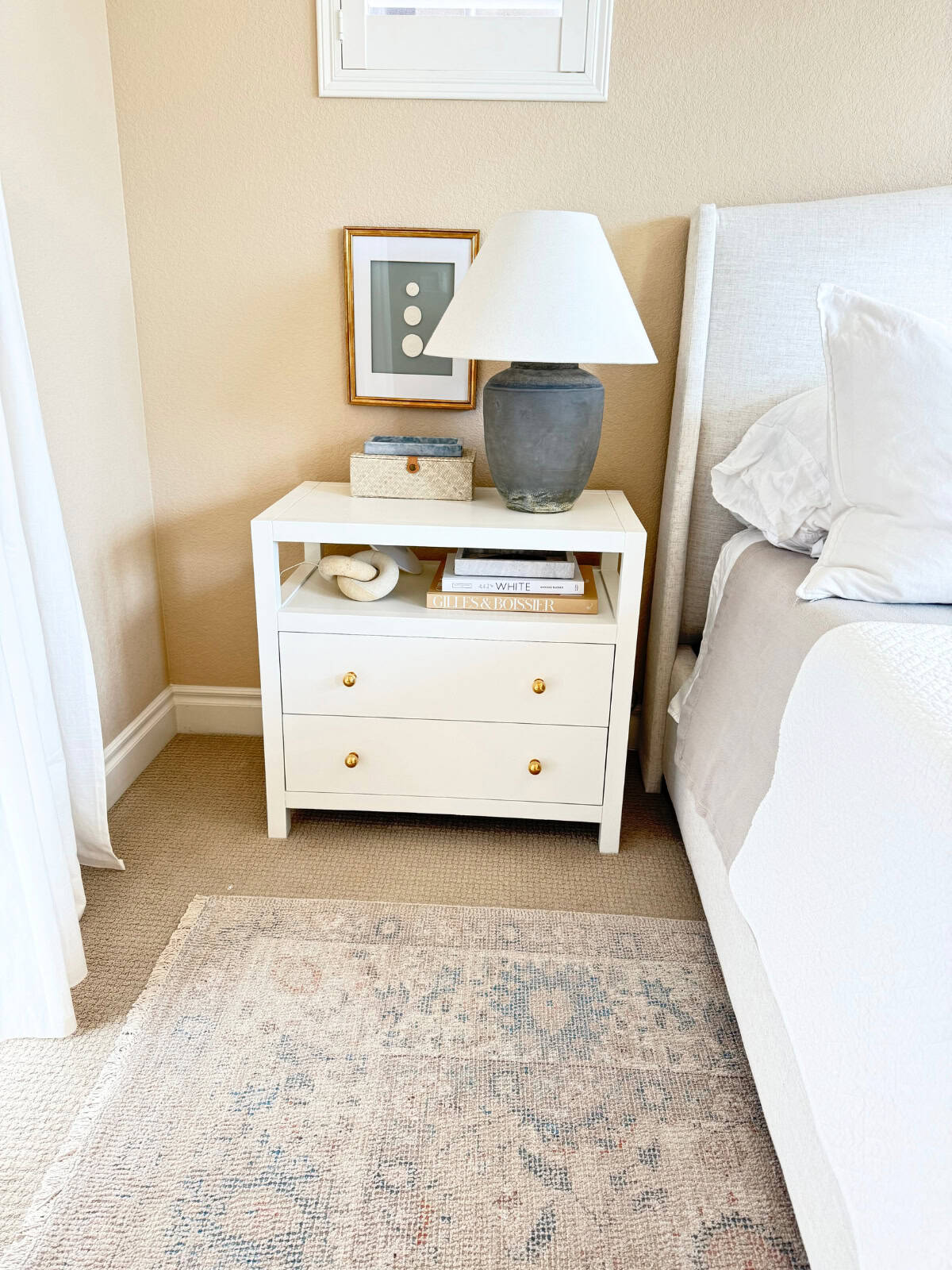 decorated white nightstand