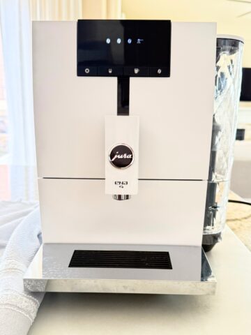 white jura coffee maker on kitchen counter