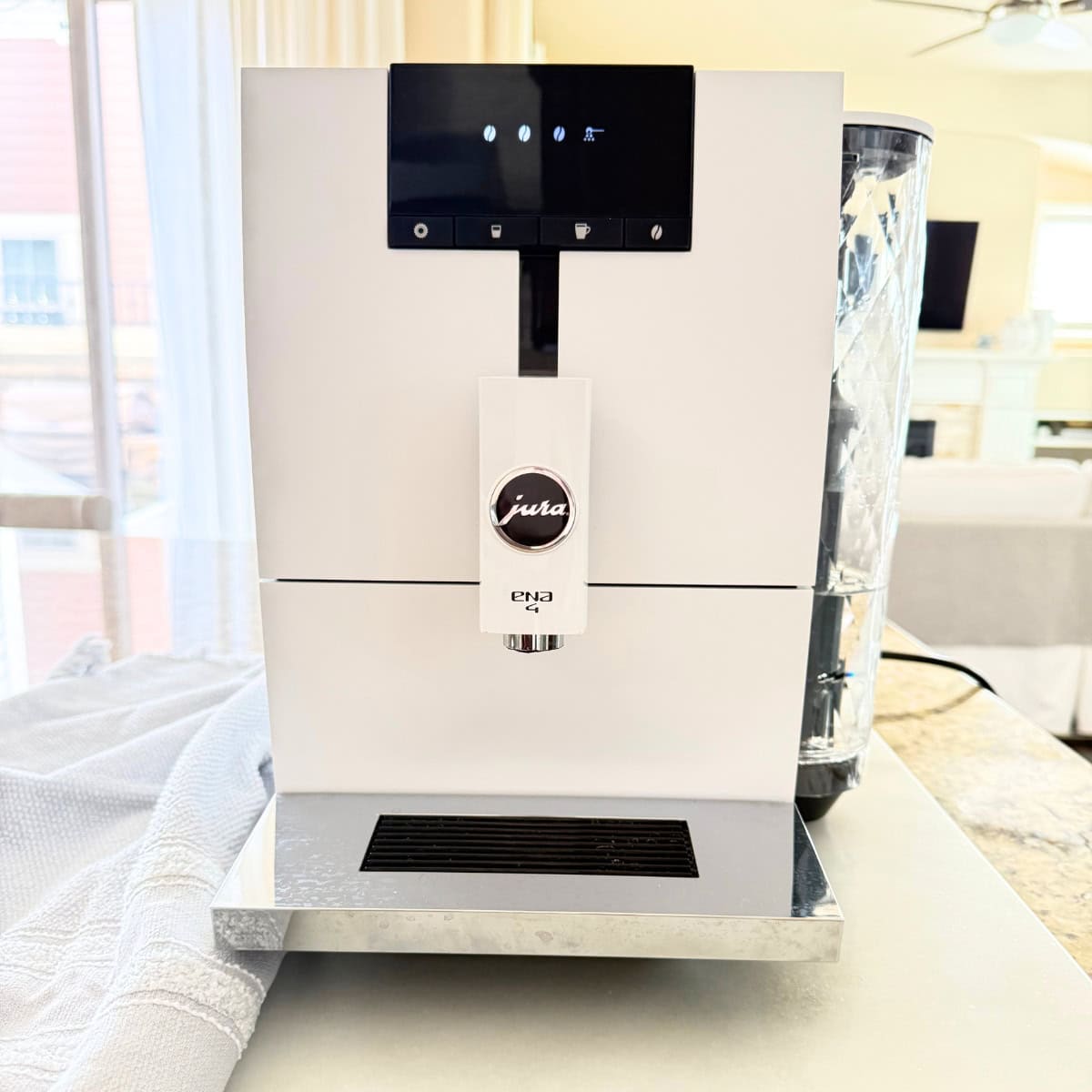 white jura coffee maker on kitchen counter