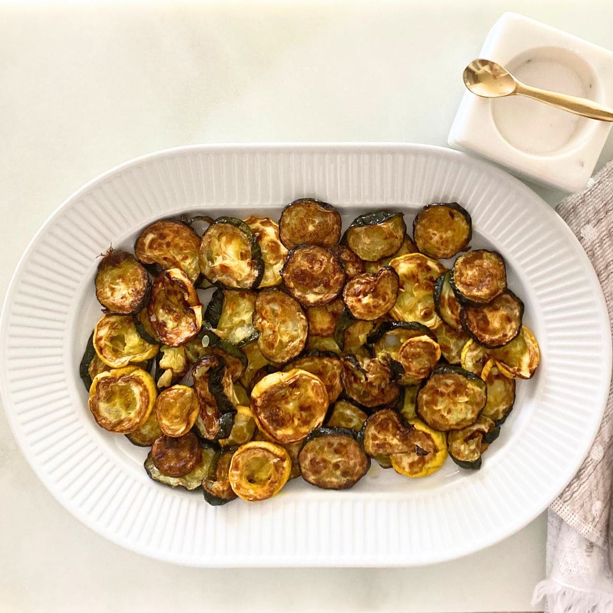 roasted zucchini and yellow squash on a platter
