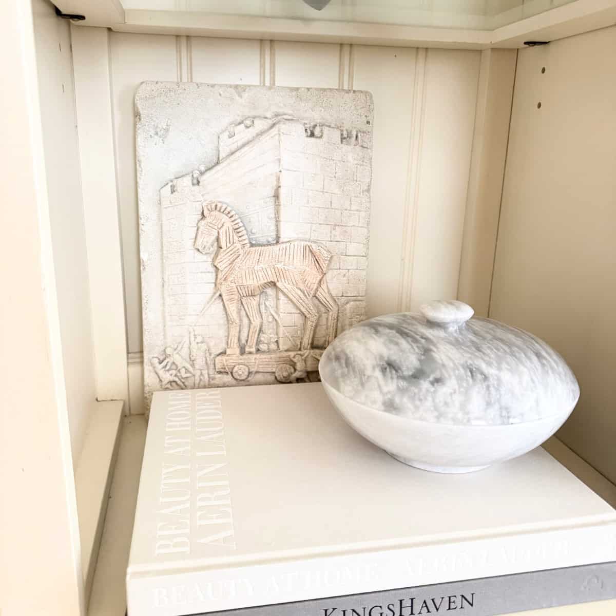 vintage plaster art styled on a shelf
