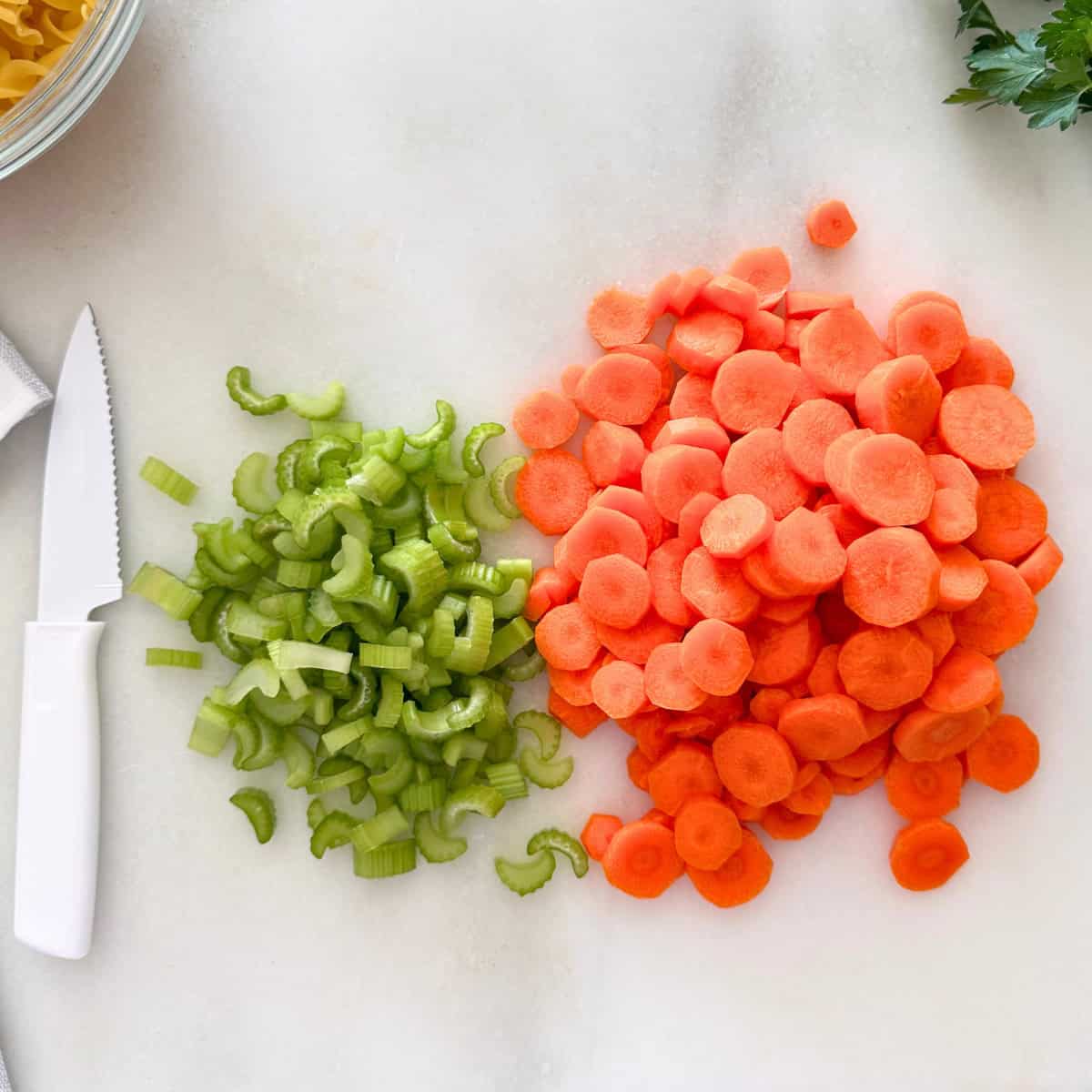 thinly sliced carrots and celery