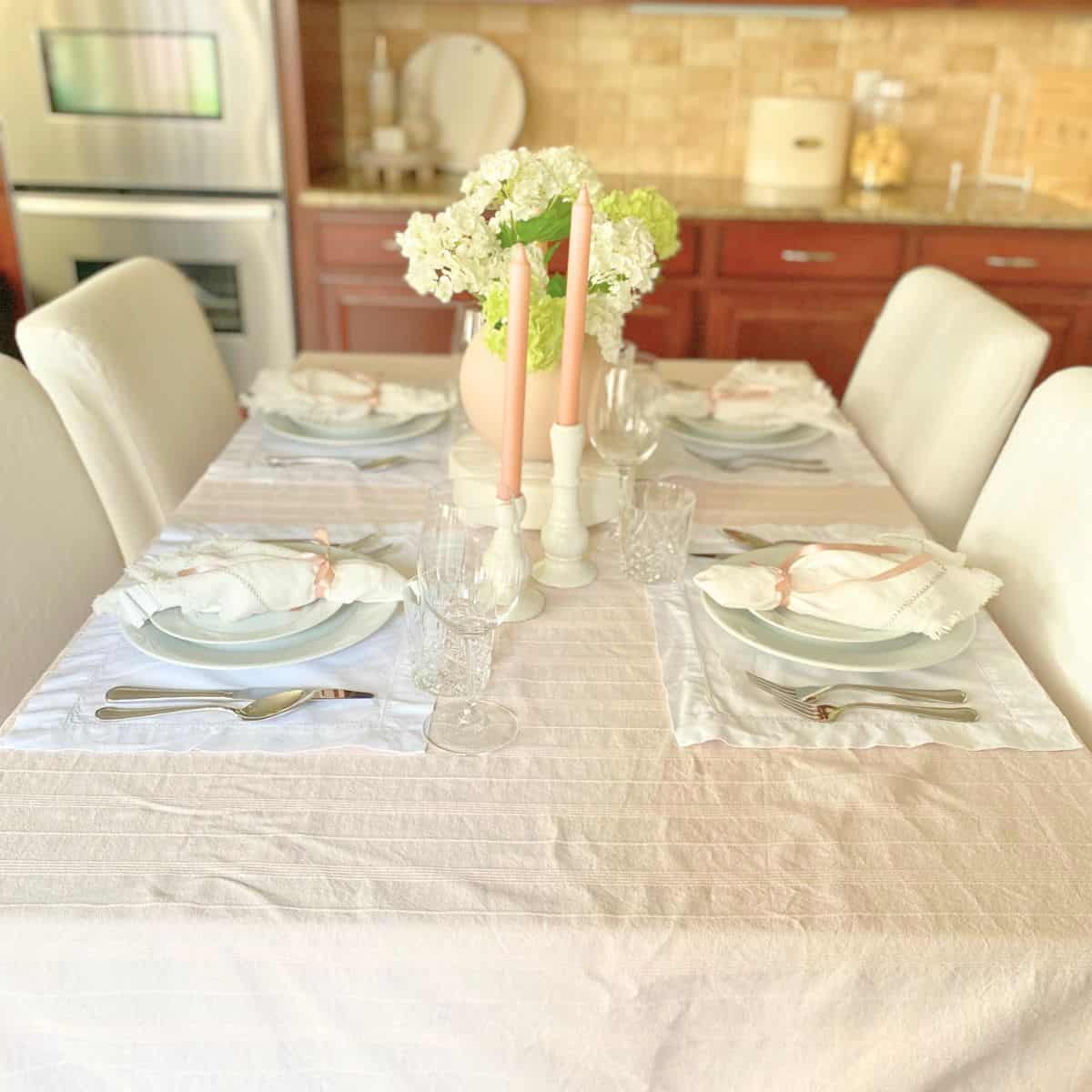 dining table decorated with spring pastel decor