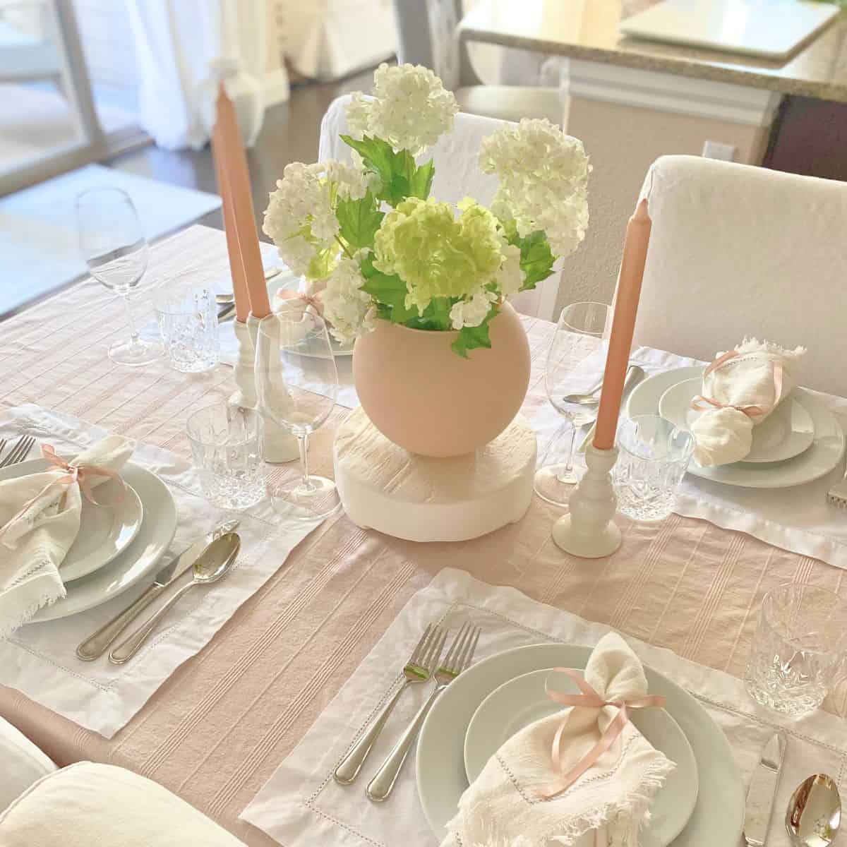 table setting with a flower centerpiece